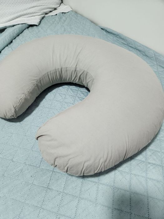 Almofada de amamentação como nova