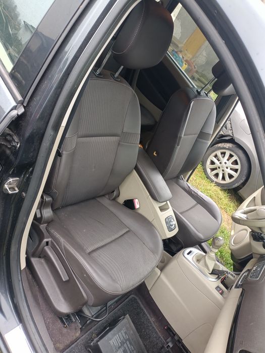 Fotele Renault Grand Scenic 3 komplet foteli boczki tapicerka brązowe