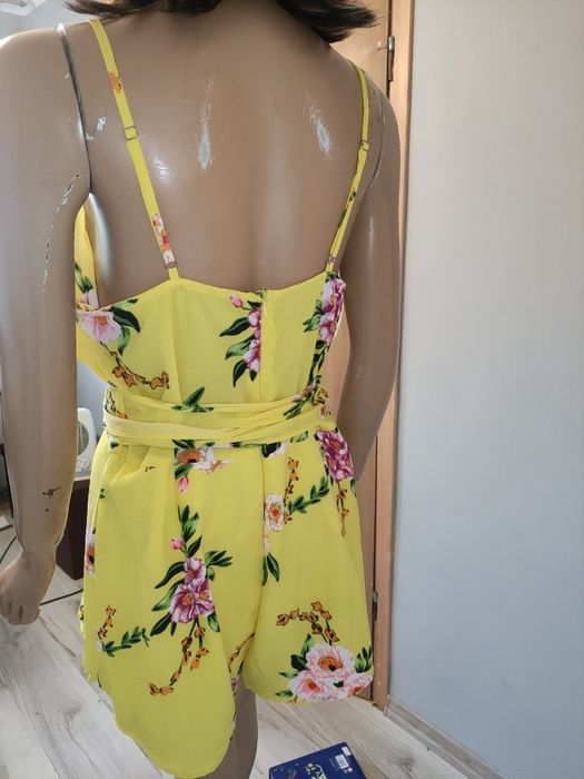 Kombinezon żółty w  kwiaty