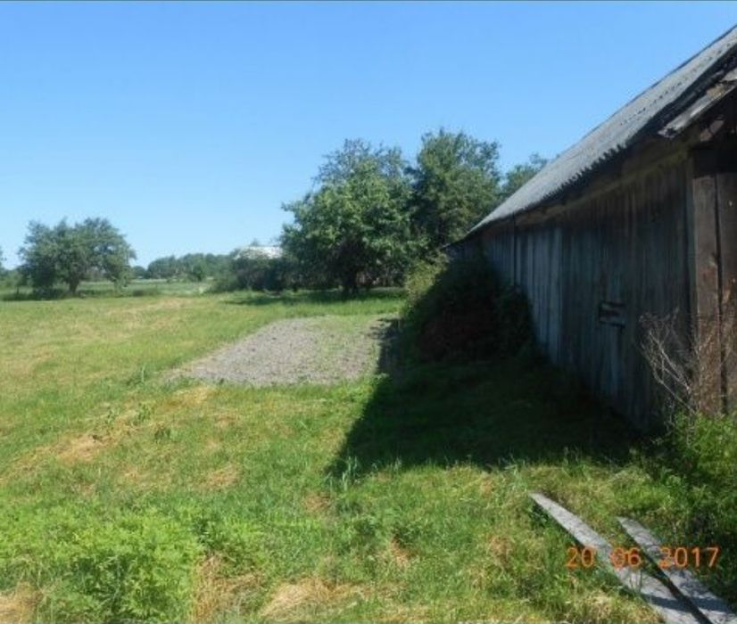 Продам будинок і земельну ділянку біля будинку