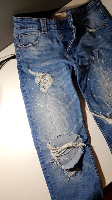 Spodnie jeans z rozdarciami
