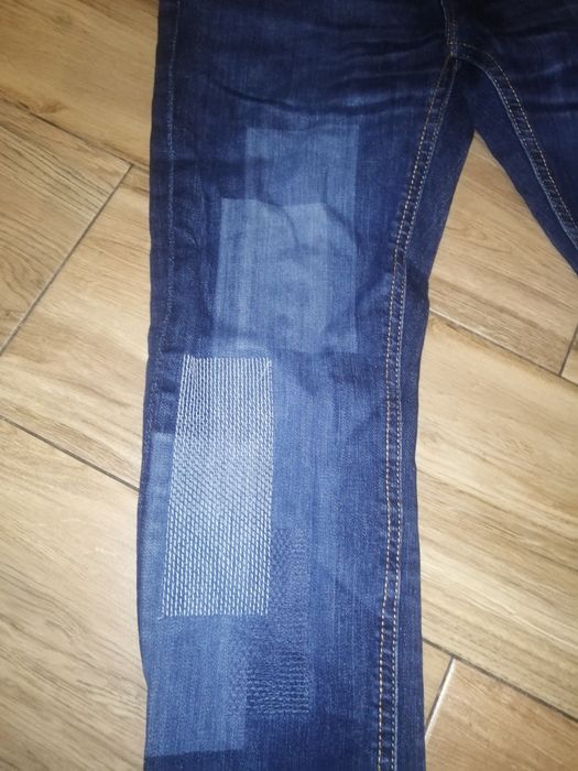Spodnie rurki S  granatowe z przeszyciami