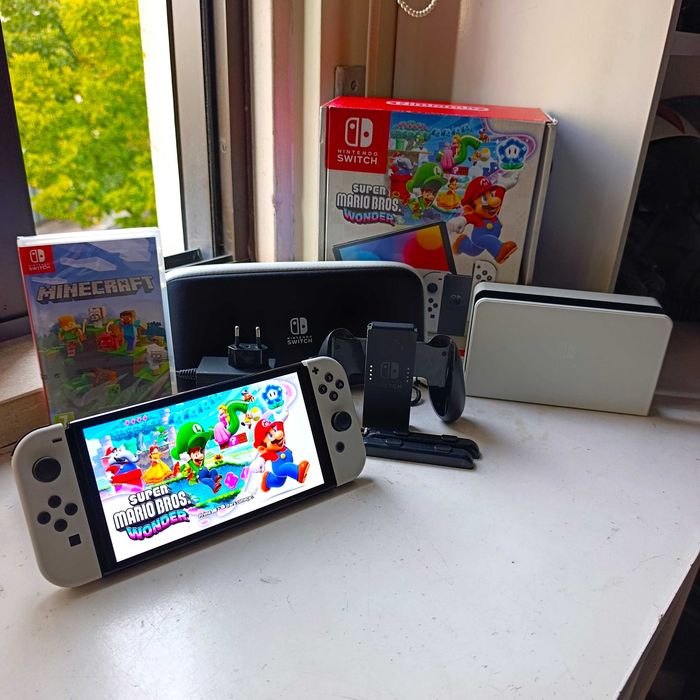 Nintendo Switch OLED + 6 Jogos + Pastinha