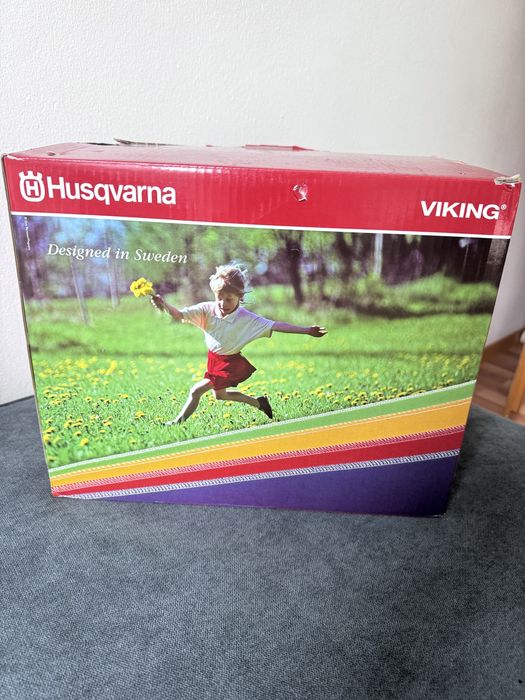 Машинка оверлок Husgvarna