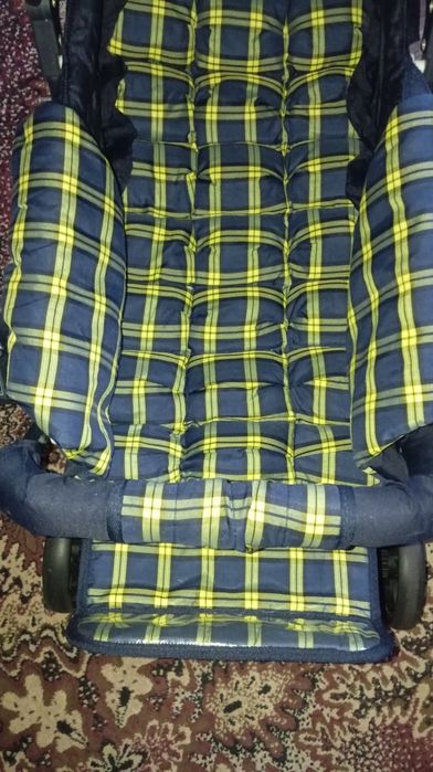 Дитяча прогулянкова коляска