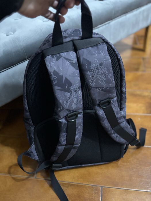 Mochila com compartimento para material fotografico