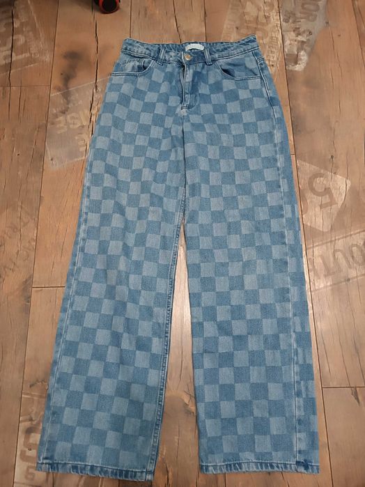 Szerokie spodnie jeansowe dla dzieczynki 152/158