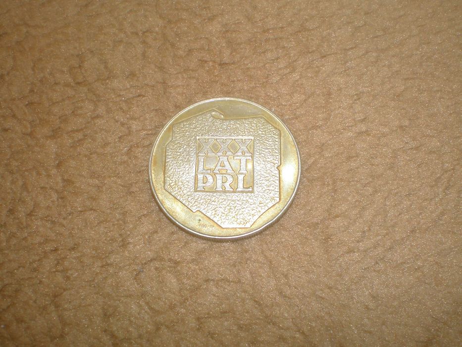 Sprzedam monetę 200 zł., z roku 1974r., XXX Lat PRL używana cena 90 zł