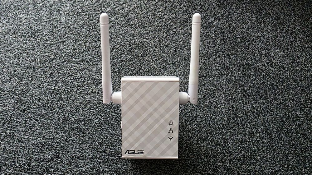 Adapter ASUS Wi-Fi RP-N12 300Mb/s Zasięg 300m,  RJ45, Ładny stan! 2,4 GHz.