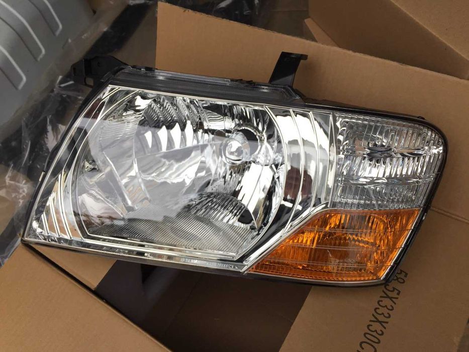 Фара Mitsubishi PAJERO III 03-07 рік