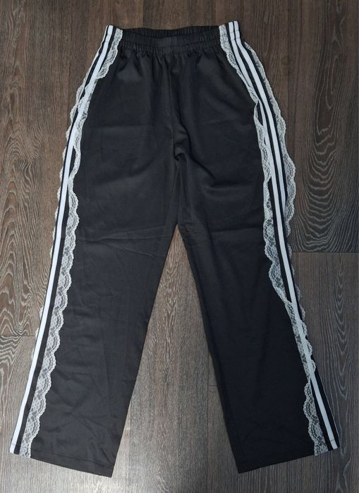Штани спортивні жіночі з мереживною обробкою