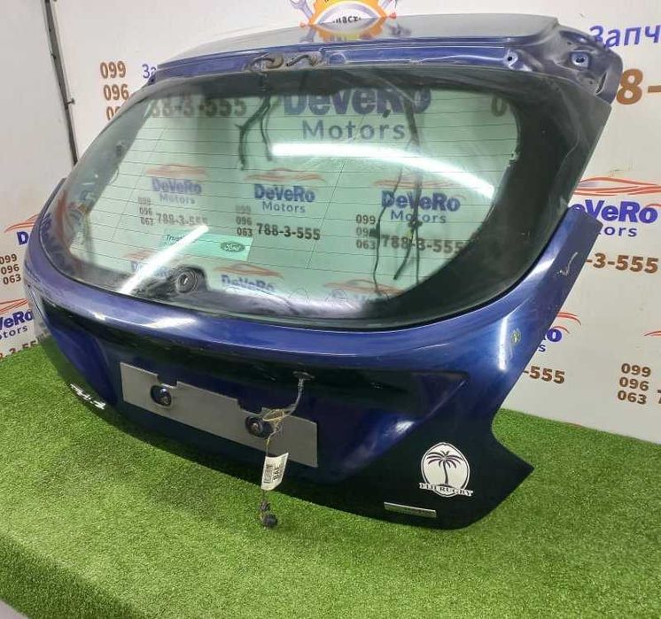 Кришка багажника Ford Focus зі склом оригінальна деталь під заміну