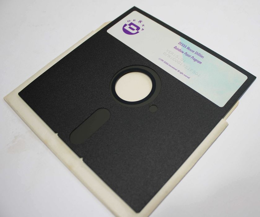 Oryginalna dyskietka z oprogramowaniem do myszki komputerowej Dexxa.