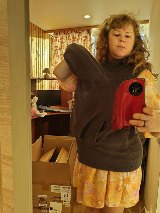 Слингожилетка, слінгоодяг, жилетка для слінгу.