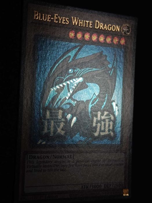 *Novo Set* Yu-Gi-Oh! 1.ª Edição 'Blue-Eyes White Dragon' (V.1 - Stramped Ultra Rare) - RA05-085 - Rarity Collection 5 - Carta de 2026