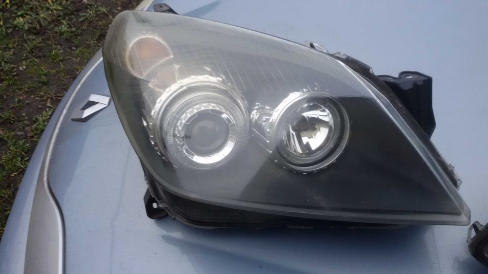 Lampy przednie Opel Astra H