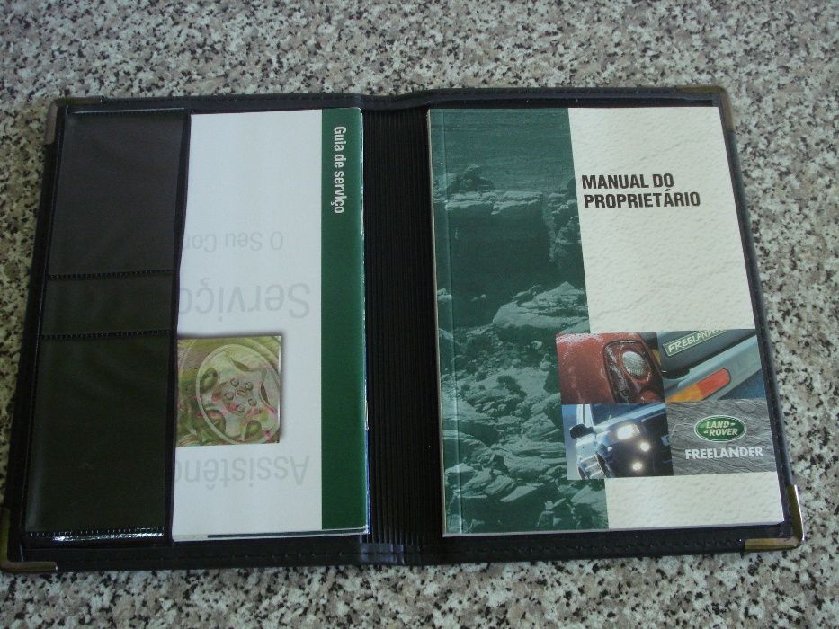 Vendo pasta com manuais freelander em português.