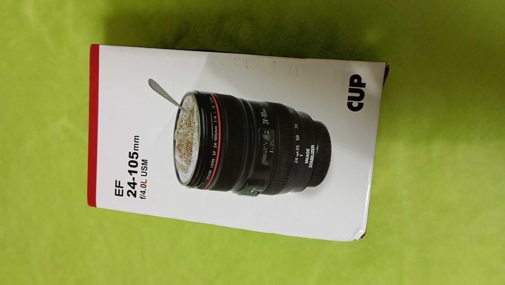 Caneca em forma de lente fotográfica