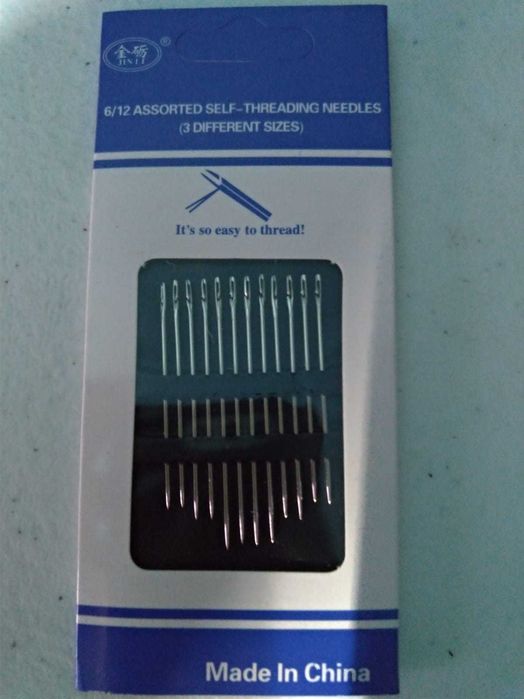 conjunto de agulhas de coser entrada da linha facilitada