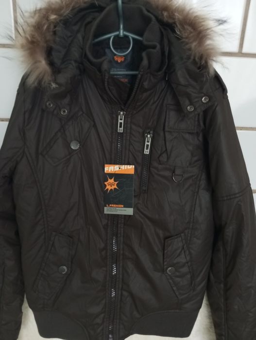 Курточкі зимові на хлопчика та футболка,тунічкі і сарафани на дівчаток