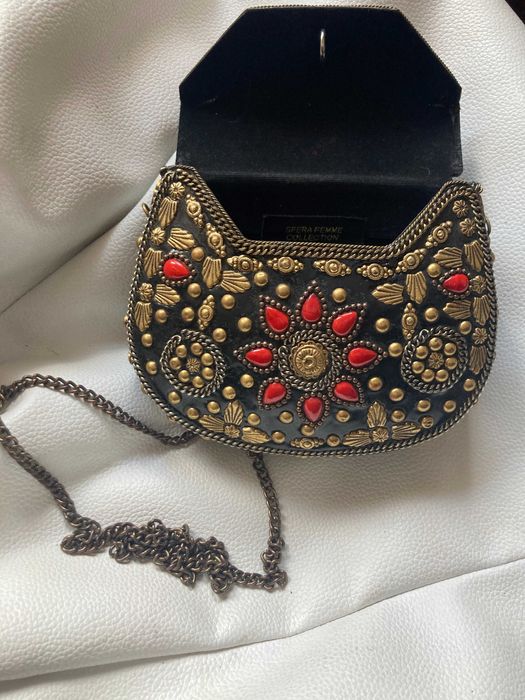 Bolsa estilo "clutch"