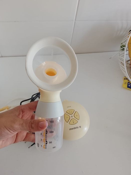 bomba de extrator de leite +canguru bebe