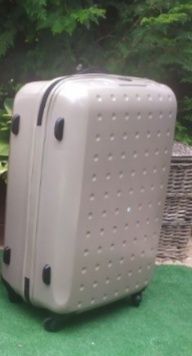 Wielka złota walizka Samsonite poliwęglan, 4 kółka 360⁰