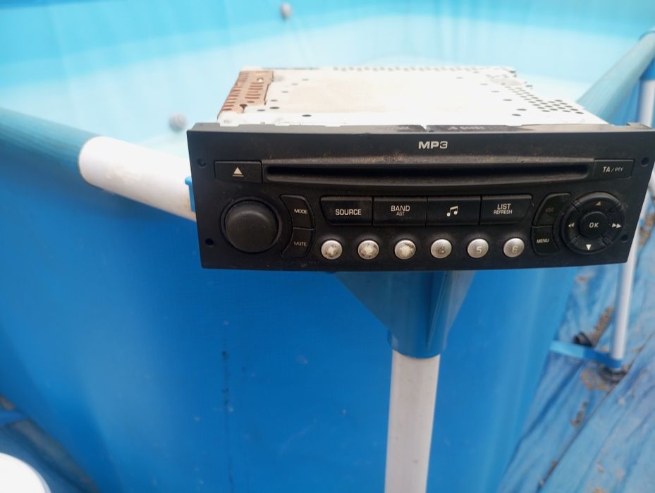 Óticas esquerdo e direito  auto radio citroen grande Picasso 2009