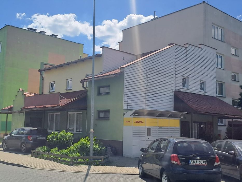 Sprzedam nieruchomość z trzema mieszkaniami i pomieszczeniem usługowym