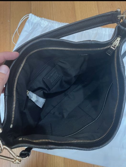 Mala coach nova com saco e alca