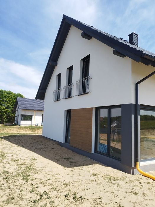 Ocieplanie elewacji , malowanie elewacji oraz mycie .