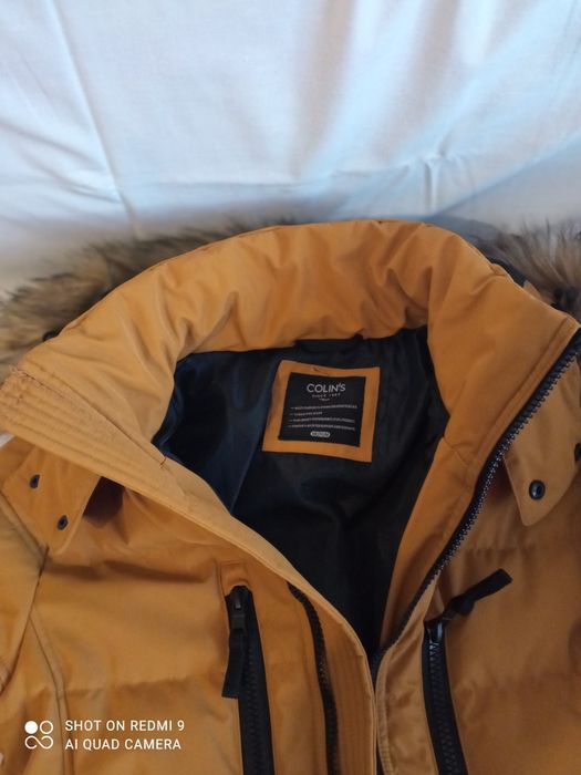 Продам пуховик Colins