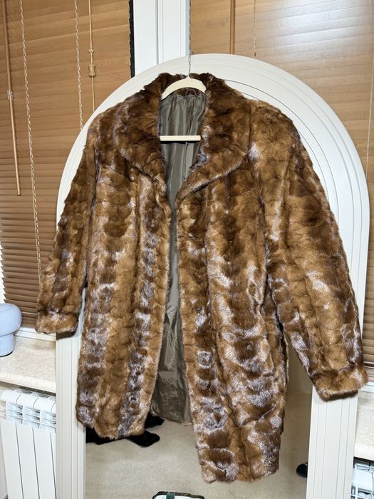 Naturalne futro damskie w kolorze brązowym z norki eleganckie