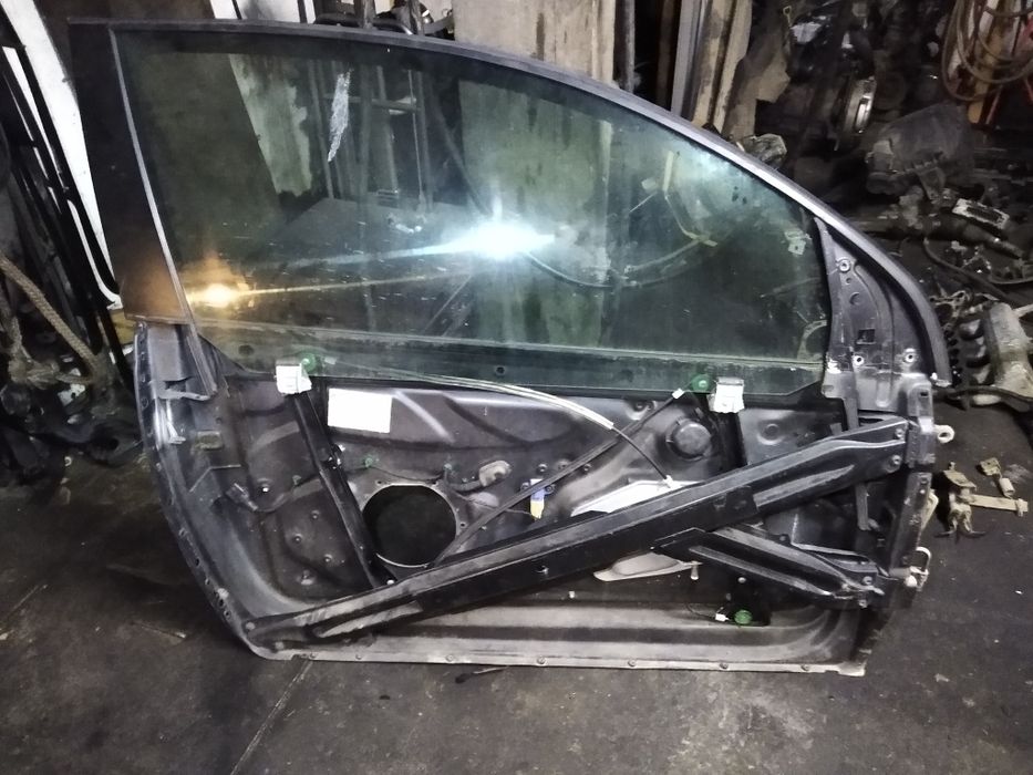 Ramka stelaż drzwi podnośnik szyba VW Golf V 3d prawa lewa