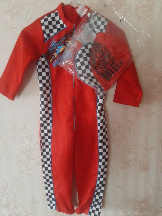 Новий комбінезон з кепкою розмір 104