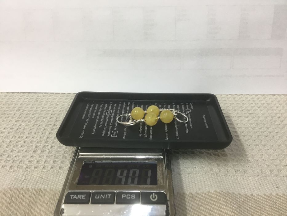 Sprzedam srebrne kolczyki z bursztynami