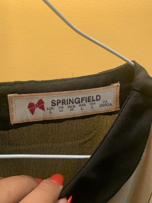 Blusa t-shirt mulher dourada/preta formal tamanho L “Springfield”