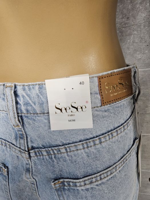 Nowe spodnie jeansowe premium SeeSee Parirs z rozdarciami rozm 40