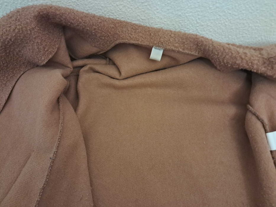 Casaco comprido de senhora