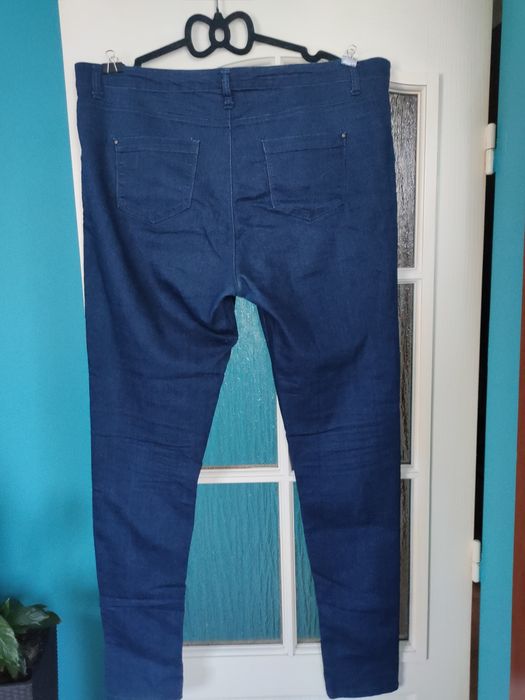 Granatowe jeansy rurki, guma w pasie, ciążowe do 122 w pasie