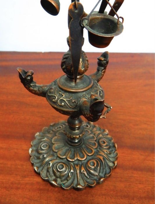 Lamparina de azeite.