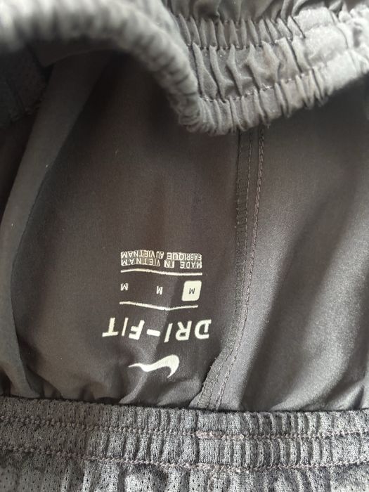 Нейлонові штани Nike