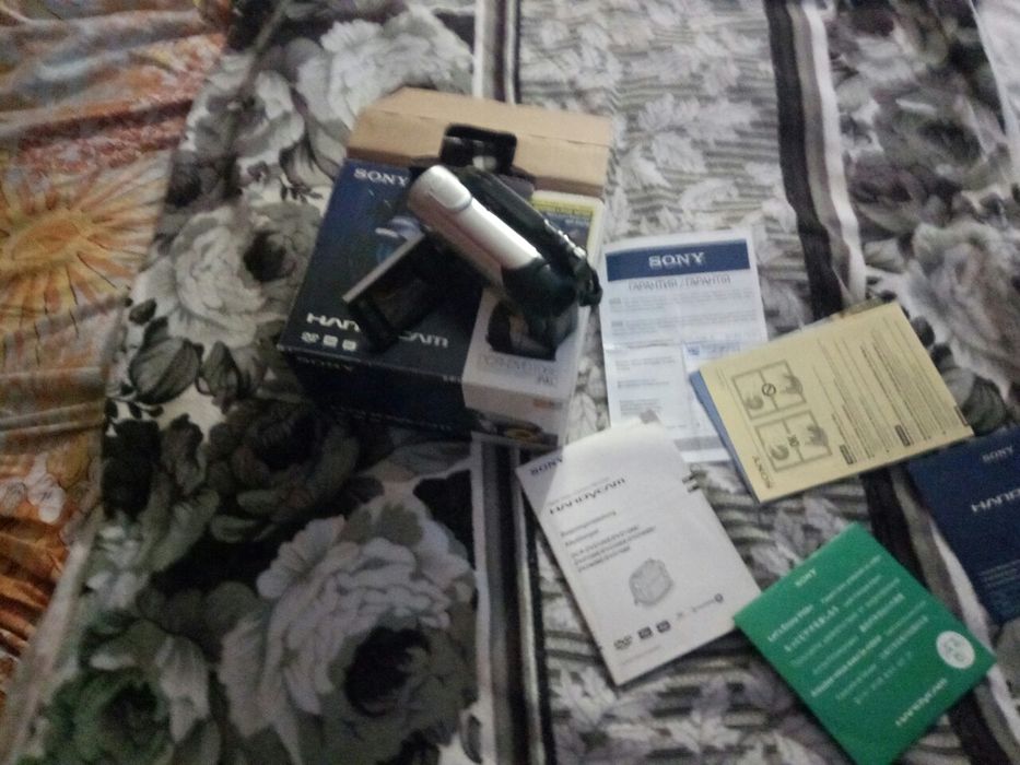 Видеокамера,бинокль,фотоаппарат три в одном