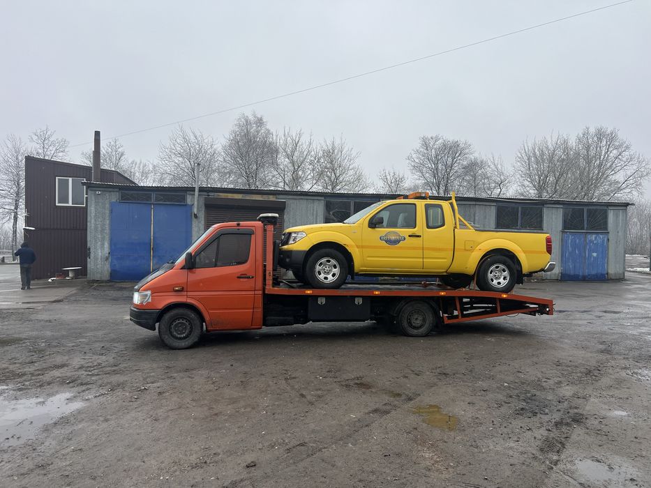 Послуги еакуатора та вантажні перевезення