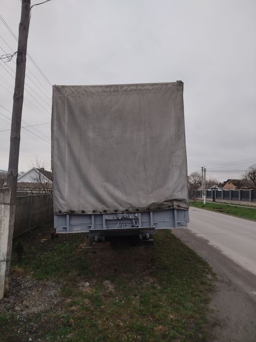 Напівпричіп бортовий тентований