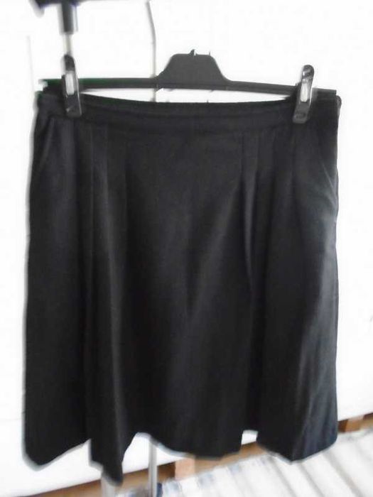 Saia preta inverno com bolsos