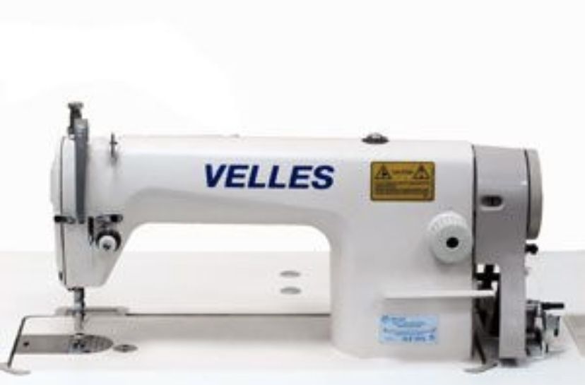 Промислова прямострочна  швейна машинка.