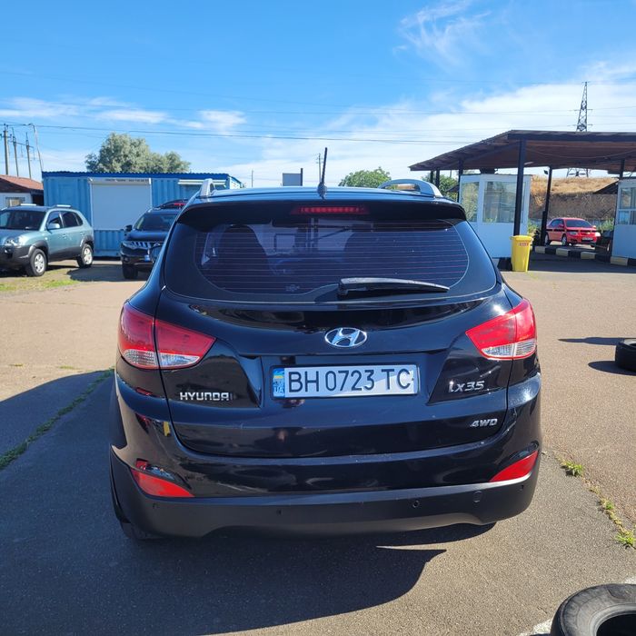 Hyundai ix35 2010 VIN KMHJU81BDBU164064 фото оголошення 3 з 9