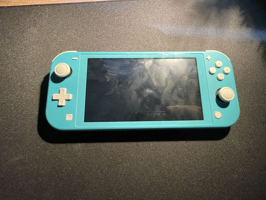 nintendo switch lite + case + gra