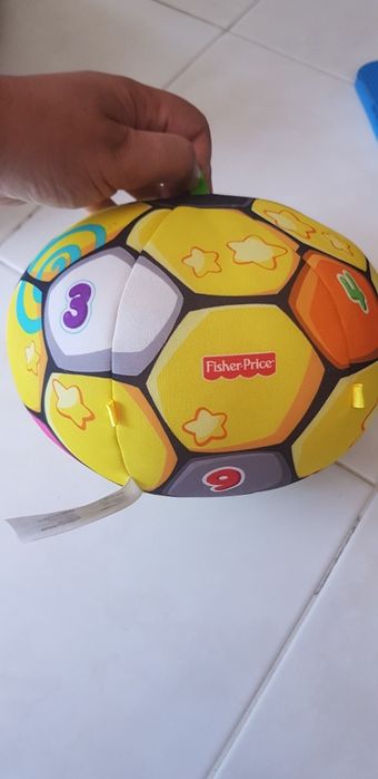 Bola didatica fisher price.